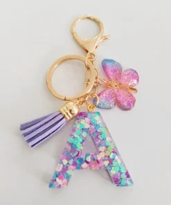 Fashion butterfly fringe initial keychain Drop glue Blend sequin A-Z26 letter keychain Cute Ladies Student Bag Accessory Gift