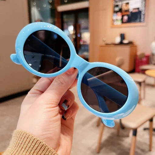 Oval Sunglasses with UV Protection in White and Black for Women - Image 5